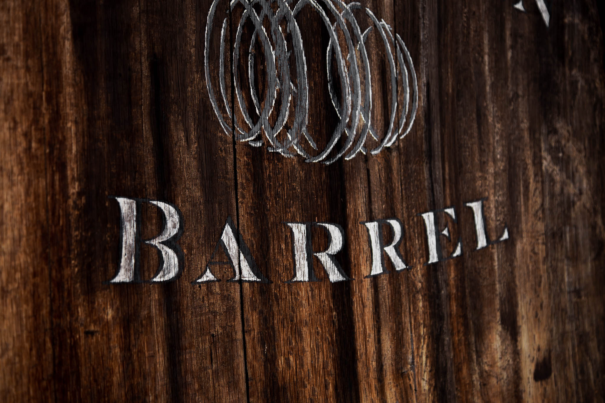 Handpainted, Hand Lettered Signage for Winery Branding on Historic Winery Barrel by Amarie Design Co. 