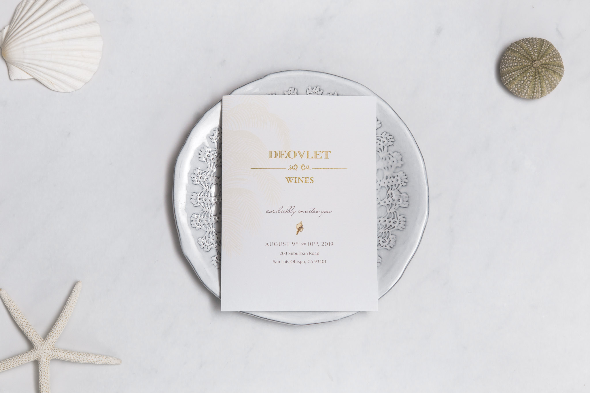 Minimal, Whitespace Flatlay of Deovlet Wines Custom Designed Invitation Card